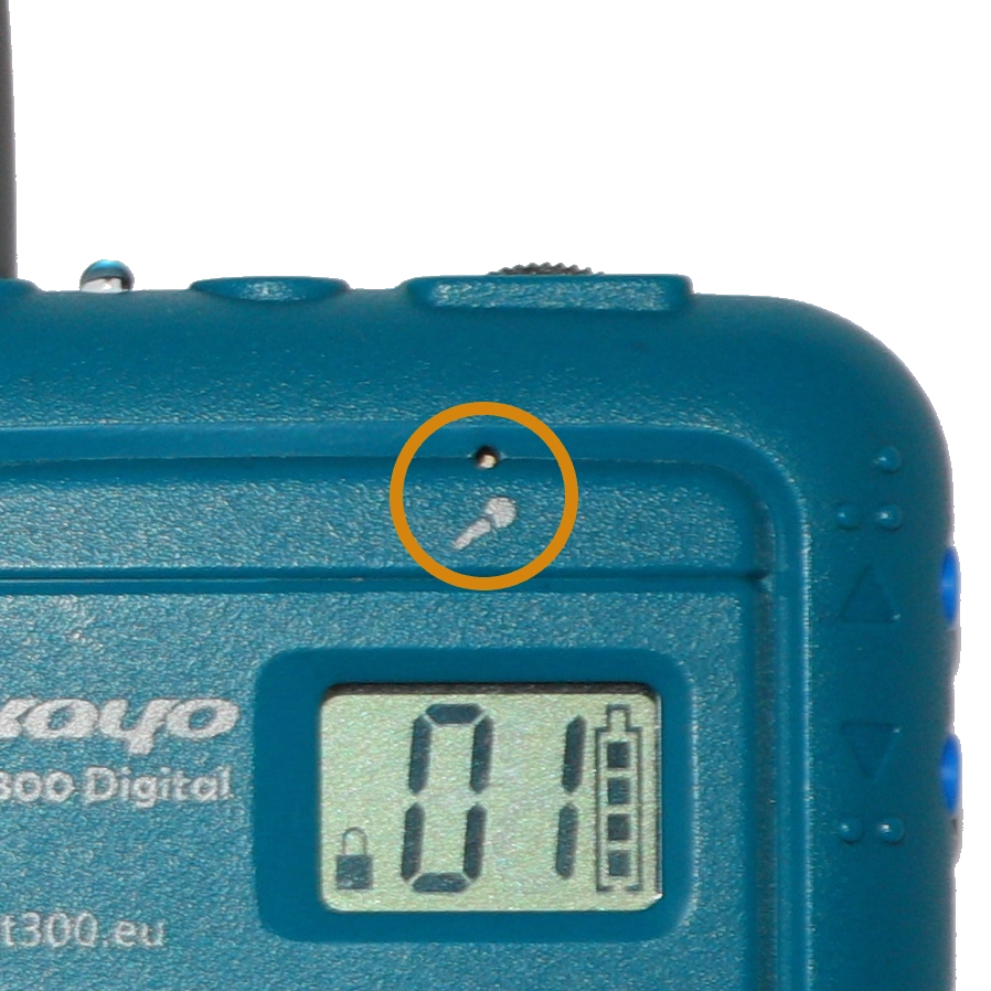Close-up of internal microphone hole on Okayo WT-300D transmitter marked with a microphone icon