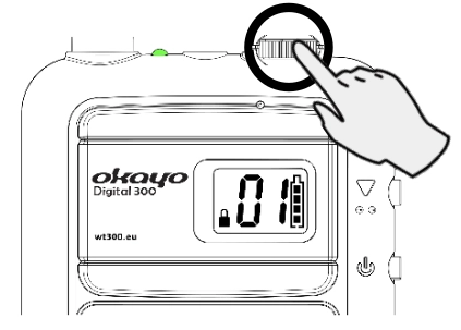 Finger adjusting the volume wheel on top of the Okayo WT-300D digital tour guide device